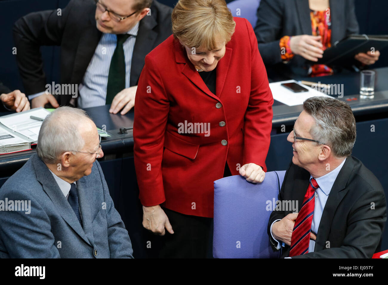 Berlin, Germany. 19th Mar, 2015. Delivery of a governmental declaration by the German Chancellor Angela Merkel in the Bundestag on March 19, 2015 in Berlin, Germany. / Picture: Wolfgang SchŠuble (CDU), German Minister of Finance, (c) Chancellor Angela Merkel (CDU), and Thomas de Maiziere (CDU), German Minister of Interior. Credit:  Reynaldo Chaib Paganelli/Alamy Live News Stock Photo