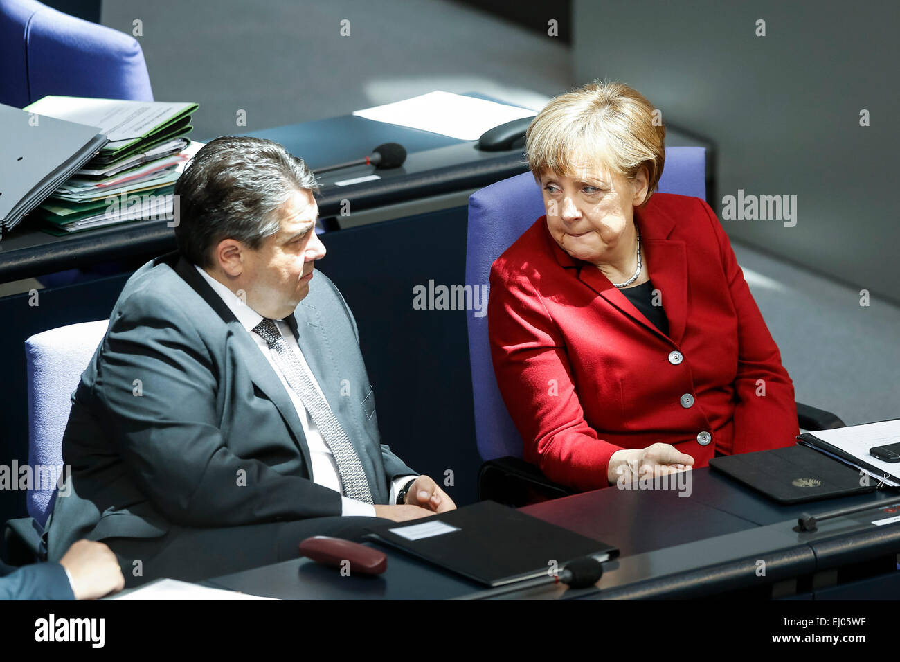 Berlin, Germany. 19th Mar, 2015. Delivery of a governmental declaration by the German Chancellor Angela Merkel in the Bundestag on March 19, 2015 in Berlin, Germany. / Picture: (l) Frank-Walter Steinmeier (SPD), German Foreign Minister, and (c) Sigmar Gabriel (SPD), German Minister of Economy and Energy, and (r) Chancellor Angela Merkel (CDU). Credit:  Reynaldo Chaib Paganelli/Alamy Live News Stock Photo
