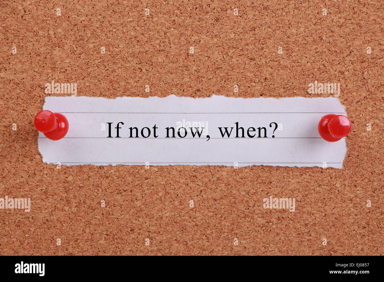'If not now,when?' note pinned on cork. Stock Photo