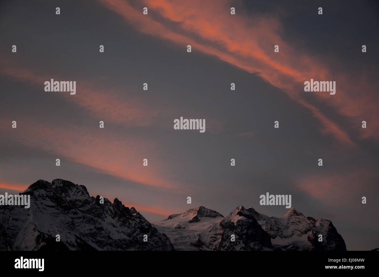 Switzerland, Europe, canton Bern, Bernese Oberland, Wetterhorn, sunrise, Morning-red, clouds, veil clouds Stock Photo