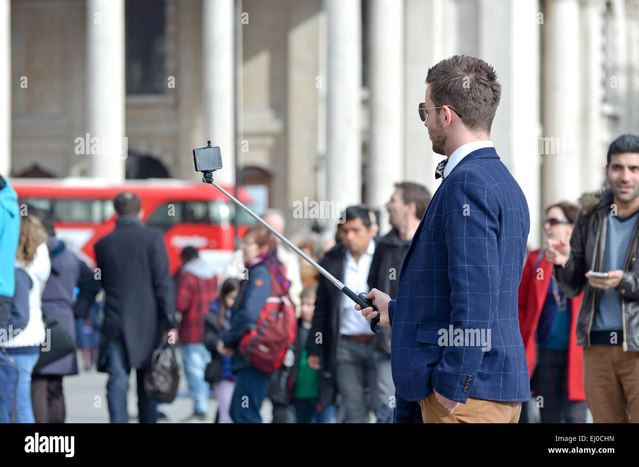 London, England, UK. man taking a selfie with a selfie stick in