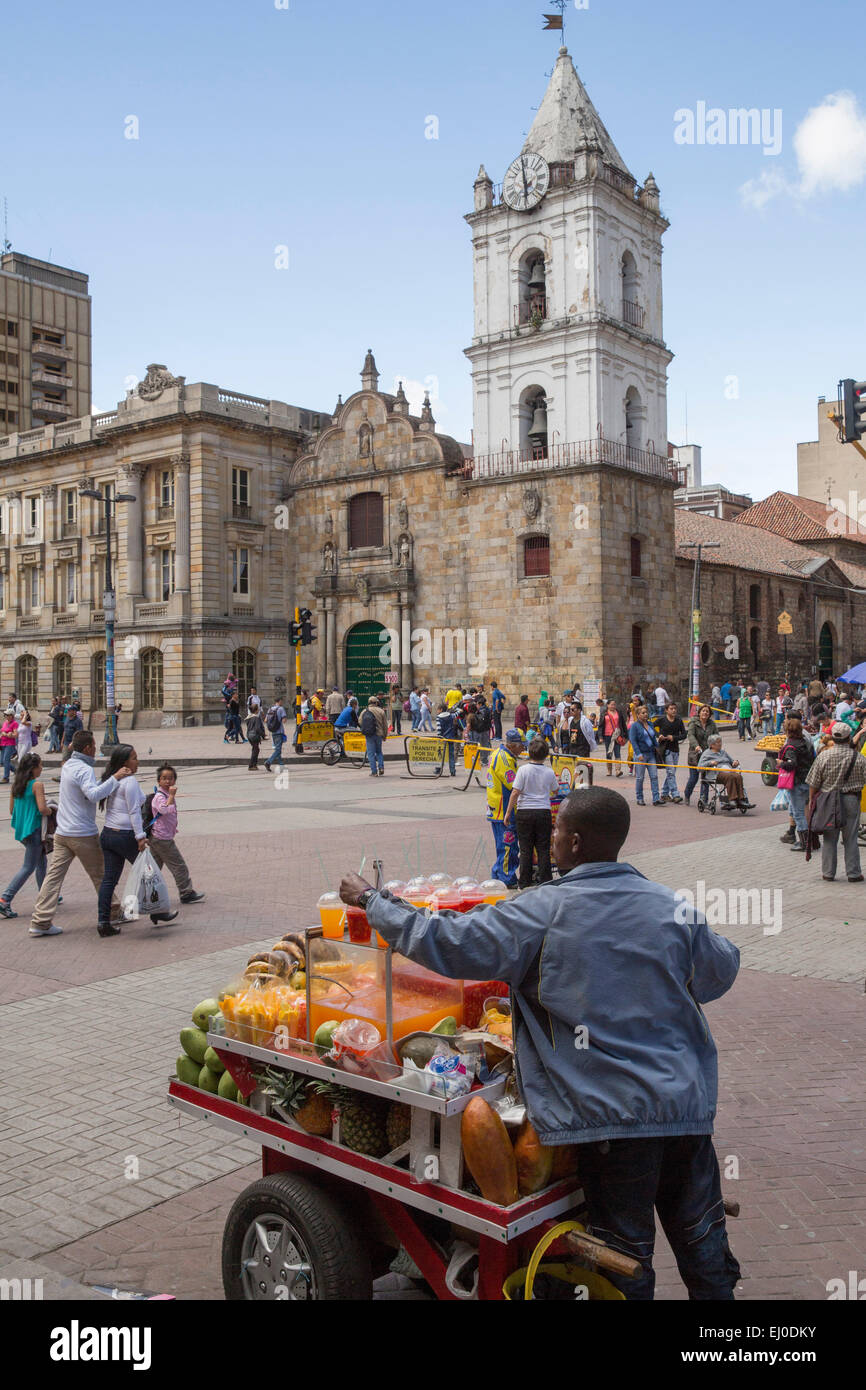 South America, Latin America, Colombia, town, city, towns, cities, town view, Bogota, capital, church, people, street vendors, Stock Photo