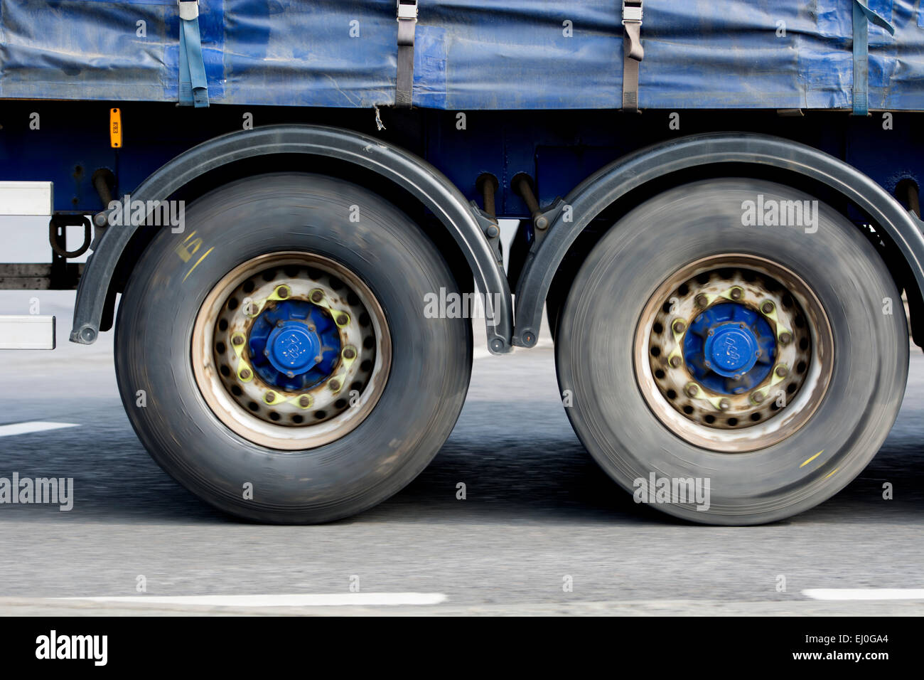 Lorry wheels at speed Stock Photo Alamy