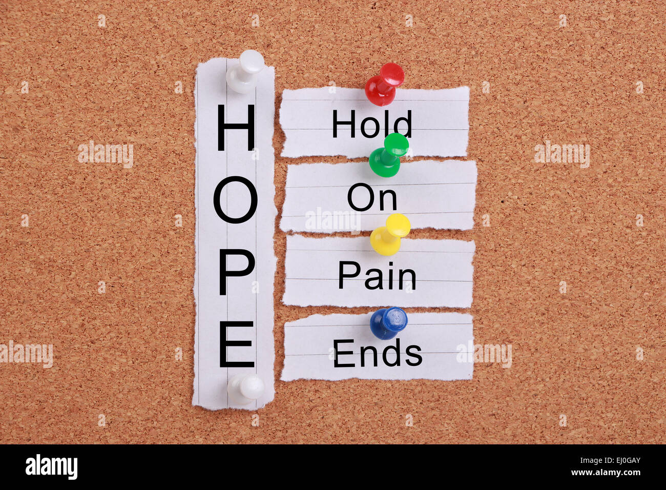 Hope concept with some related words pinned on cork board. Stock Photo