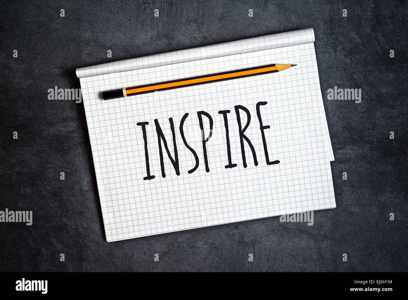 Inspire Creative Writing Concept With Pencil and Notepad on Table, Top View. Stock Photo