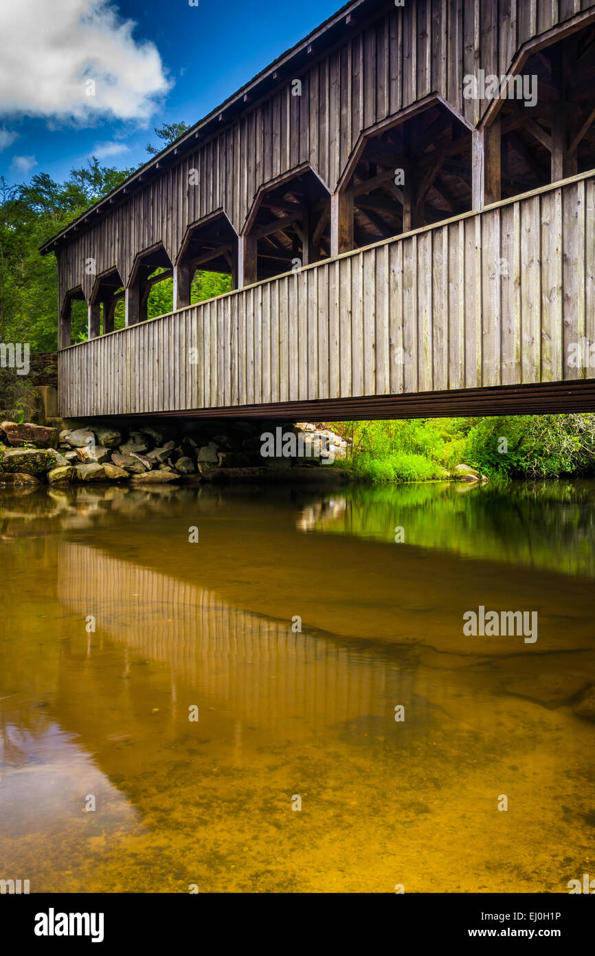 The covered bridge above High Falls, in Dupont State Forest, North Carolina. Stock Photo
