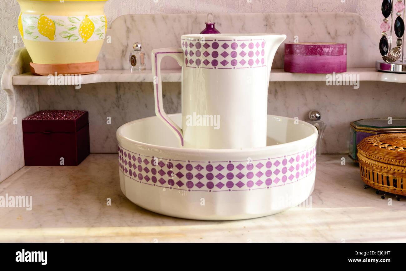 pitcher and lavatory bowl in a rustic bedroom Stock Photo Alamy