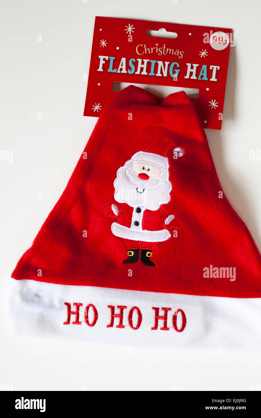 Ho ho ho Santa Claus Father Christmas flashing hat set on white background Stock Photo