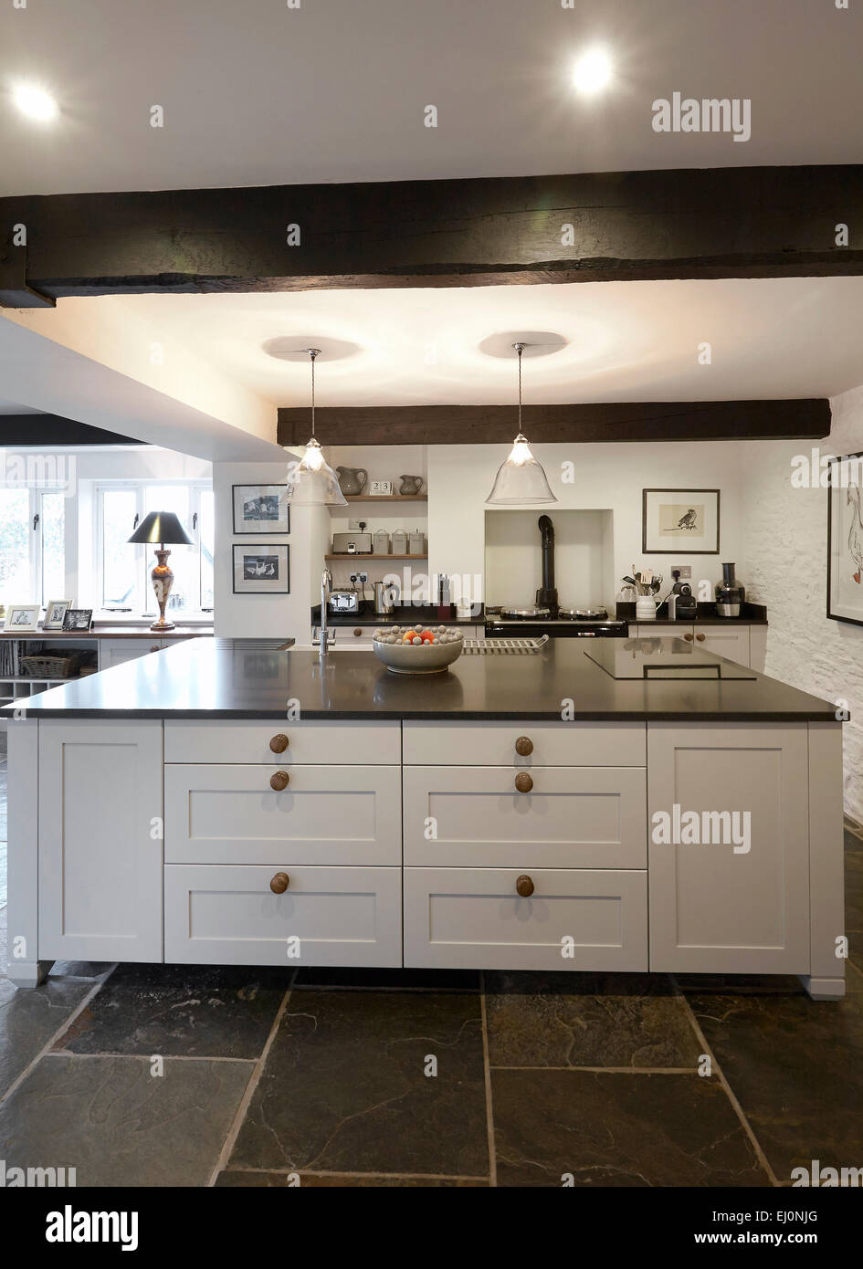A White Country Style Kitchen In A Farmhouse In The Uk Stock Photo