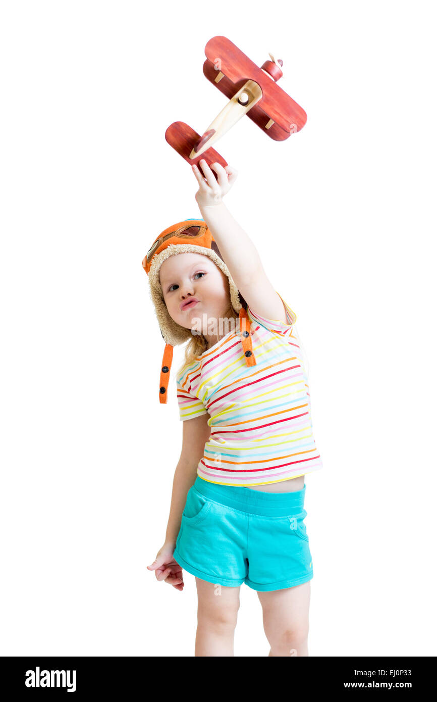 happy child pilot and playing with wooden airplane toy Stock Photo - Alamy