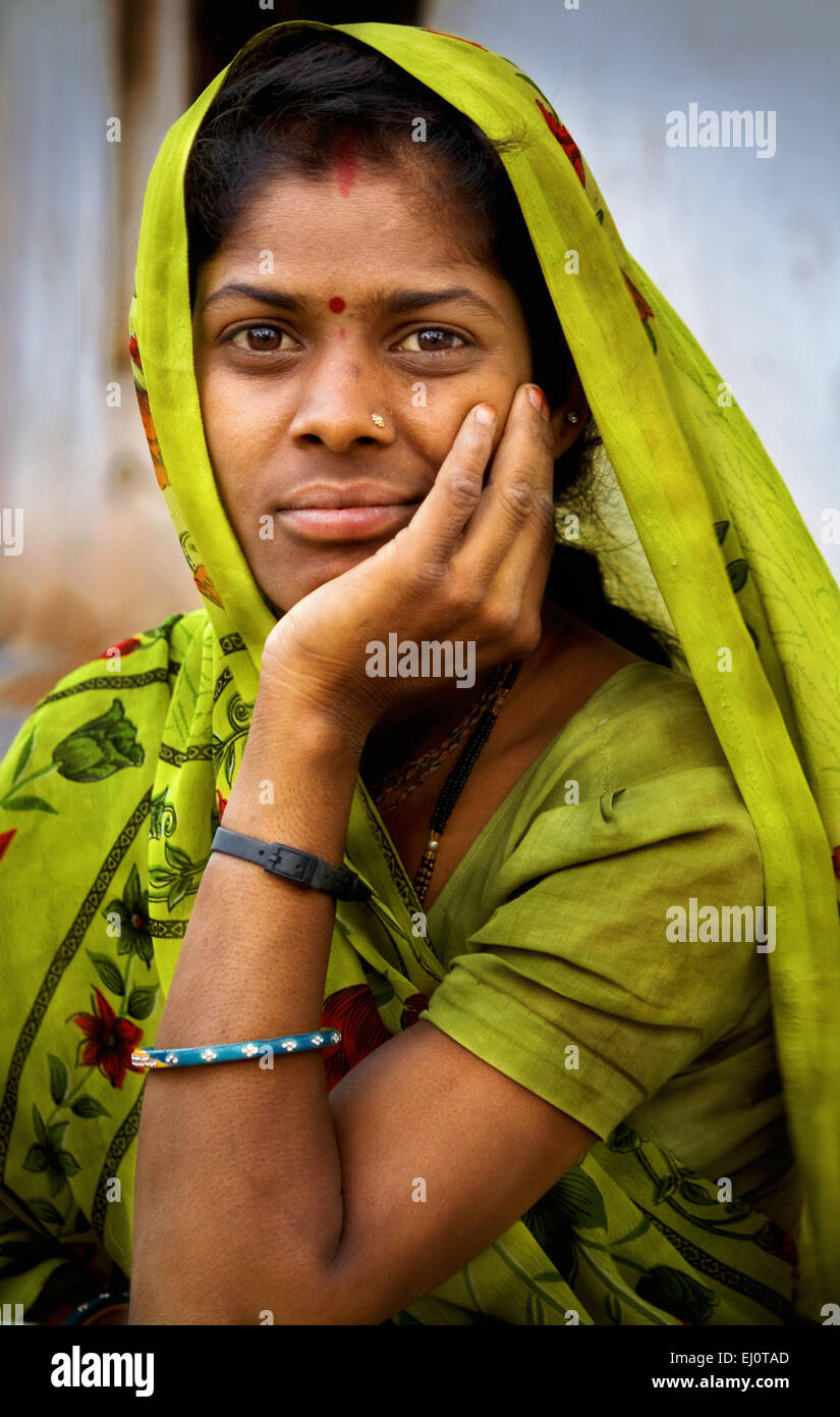 Portrait of a rural Indian lady in green sari. Stock Photo