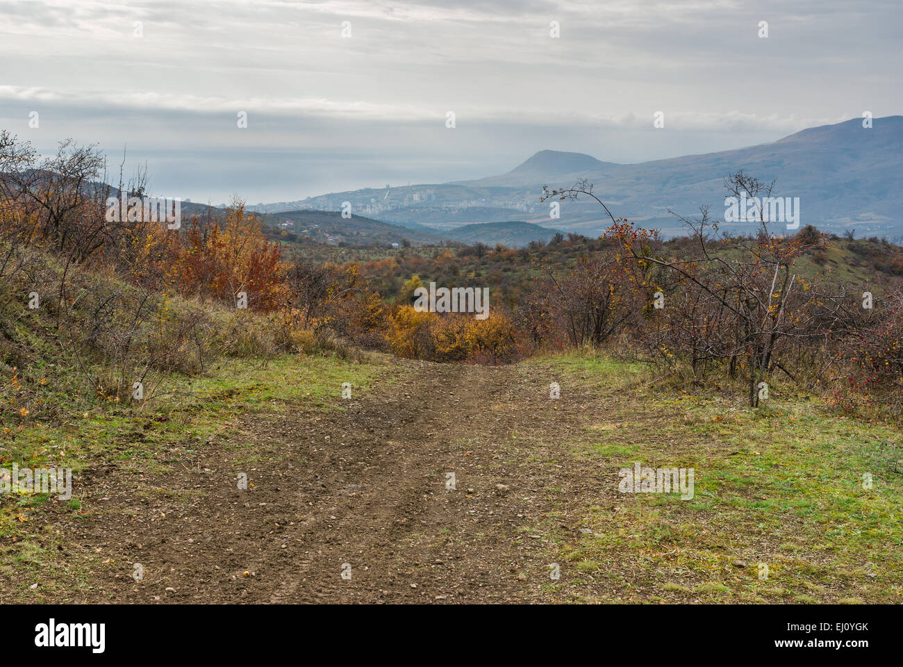 View from mountain pasture Demerdzhi down to Black Sea shore and Alushta resort at autumnal morning, Crimea, Ukraine. Stock Photo