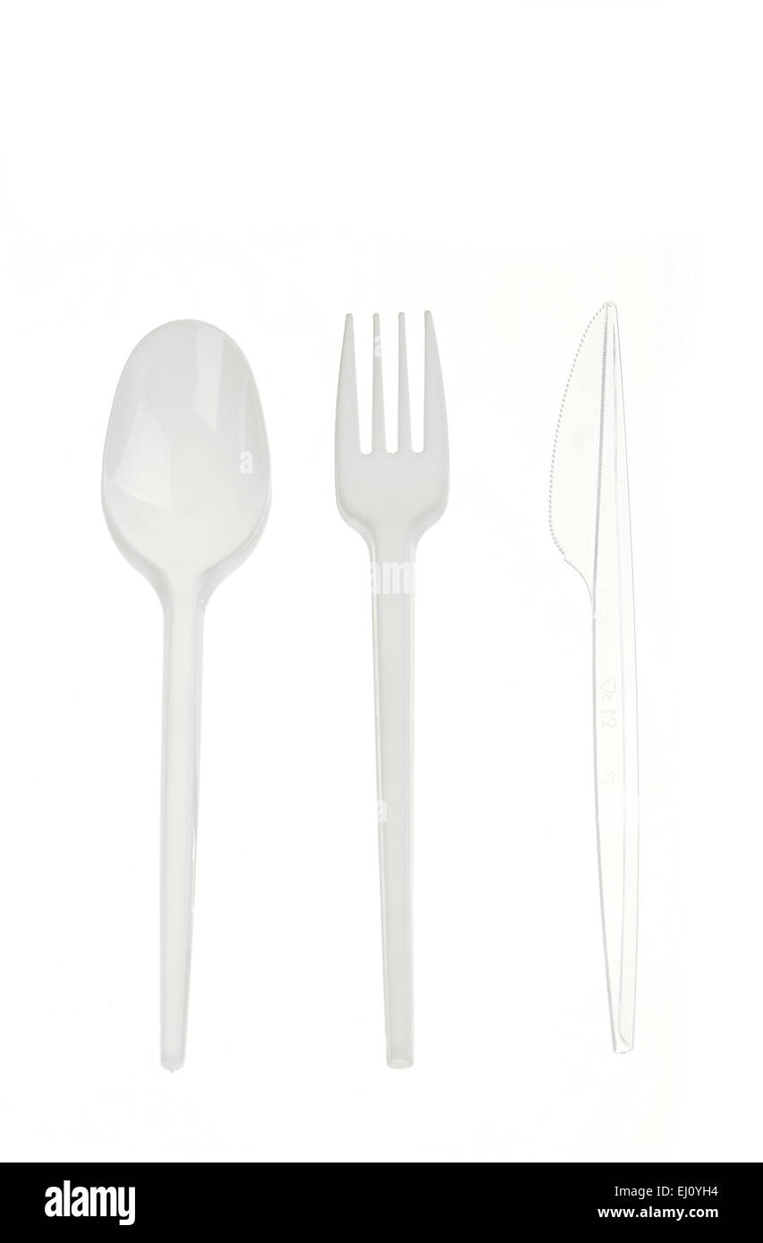 plastic cutlery on white background Stock Photo
