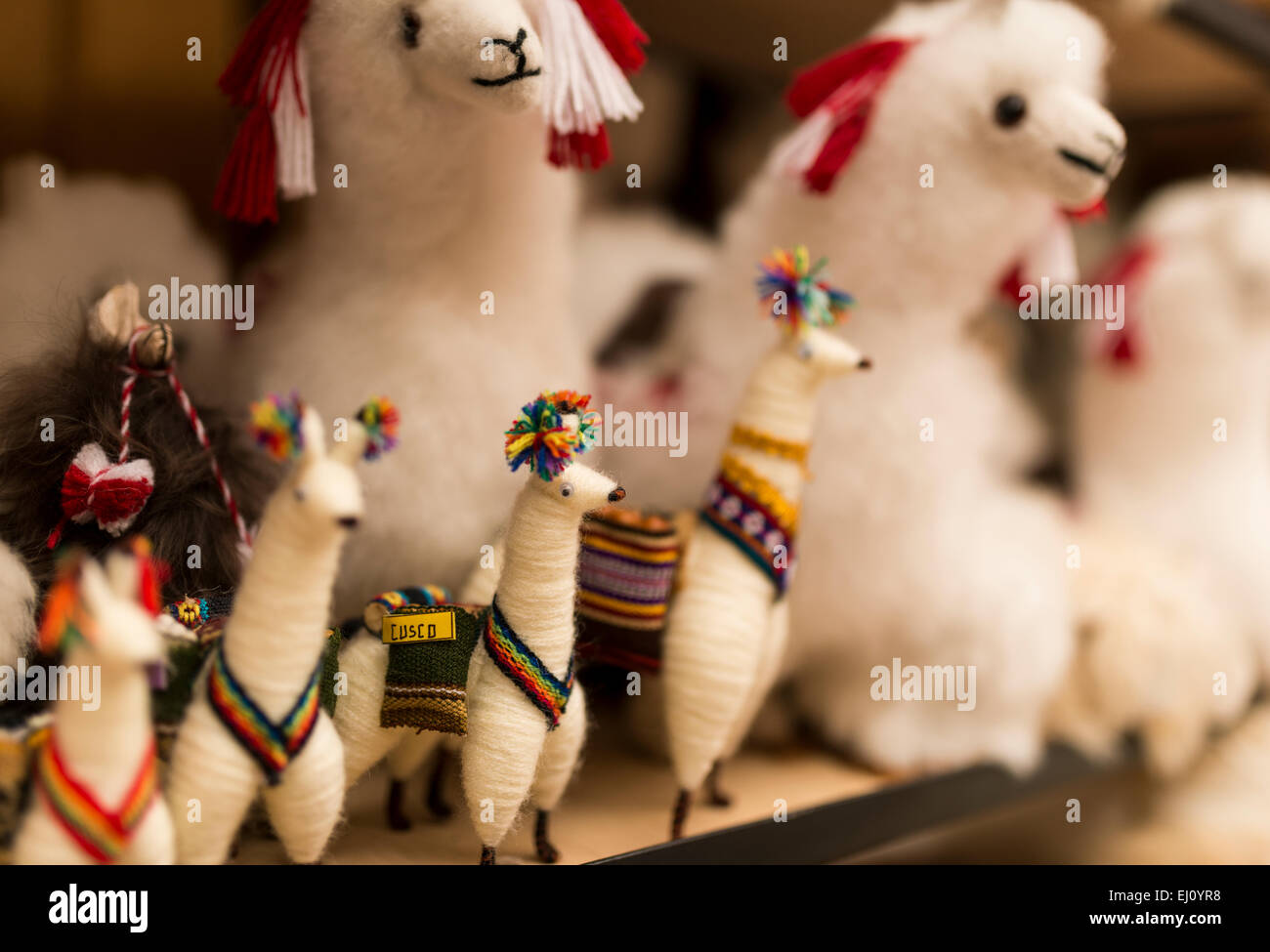 Alpaca toys for sale at Pisac Textiles Market, Sacred Valley, Peru Stock Photo