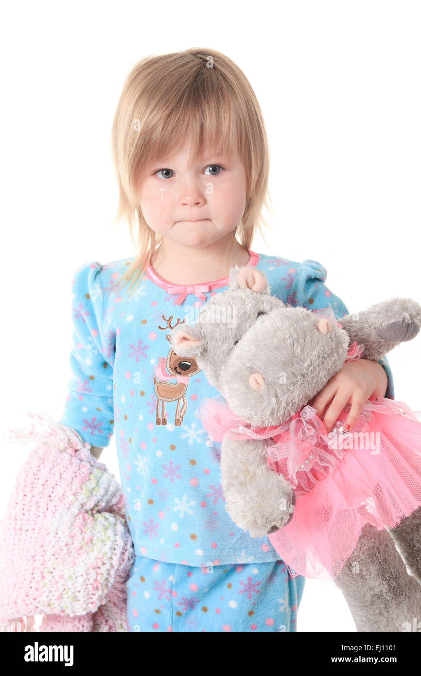 Little girl in pajamas isolated on white background Stock Photo - Alamy