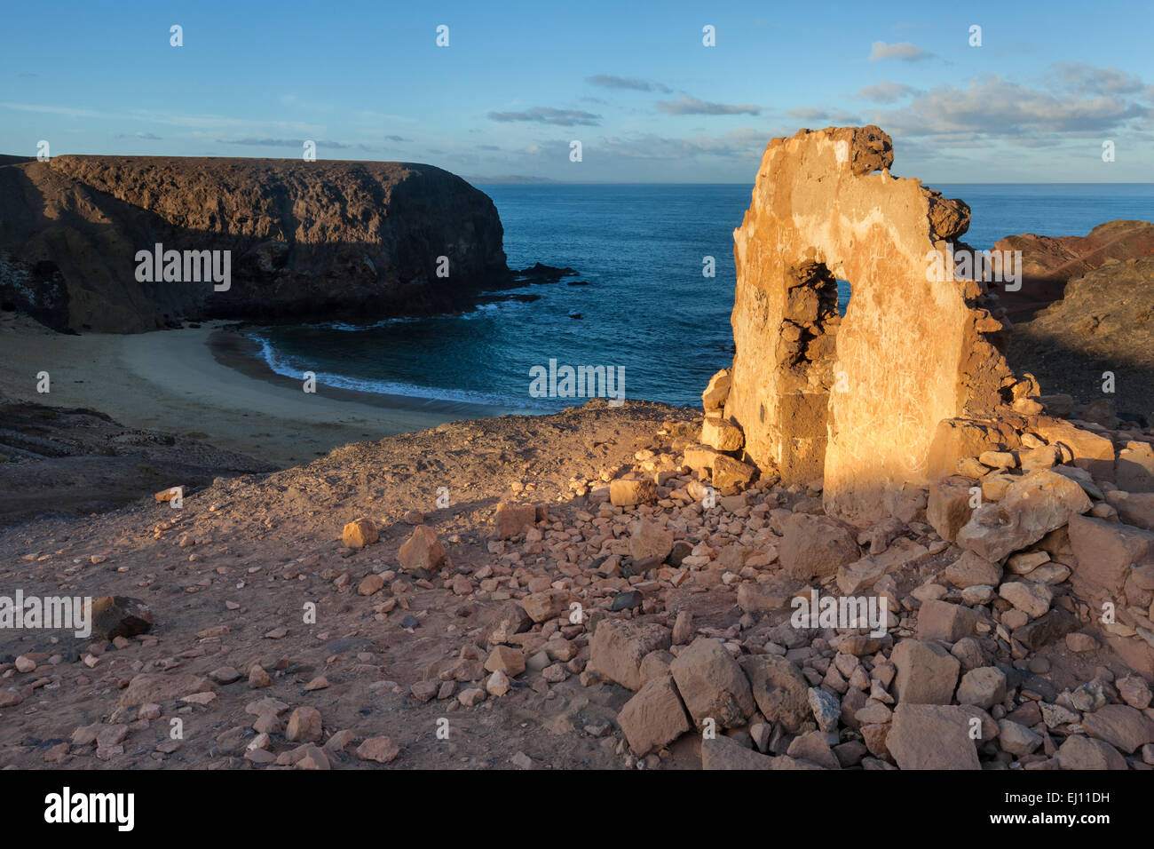 Punta del Papagayo, Spain, Europe, Canary islands, Lanzarote, sea, coast, rock, cliff, ruins, morning light Stock Photo
