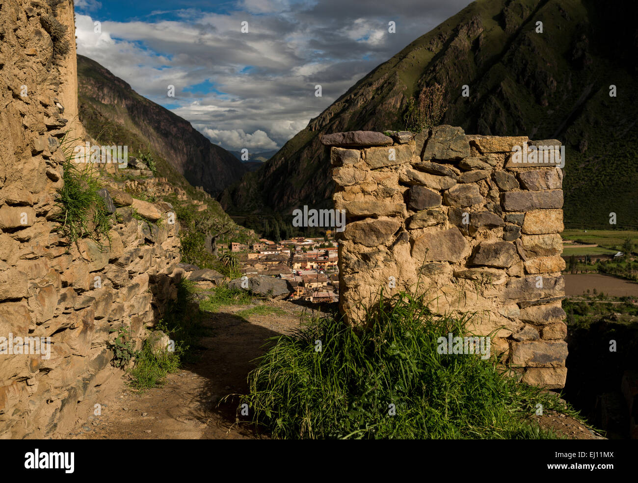 Ollantaytambo Ruins with Village of Ollantaytambo in background, Sacred Valley, Peru Stock Photo