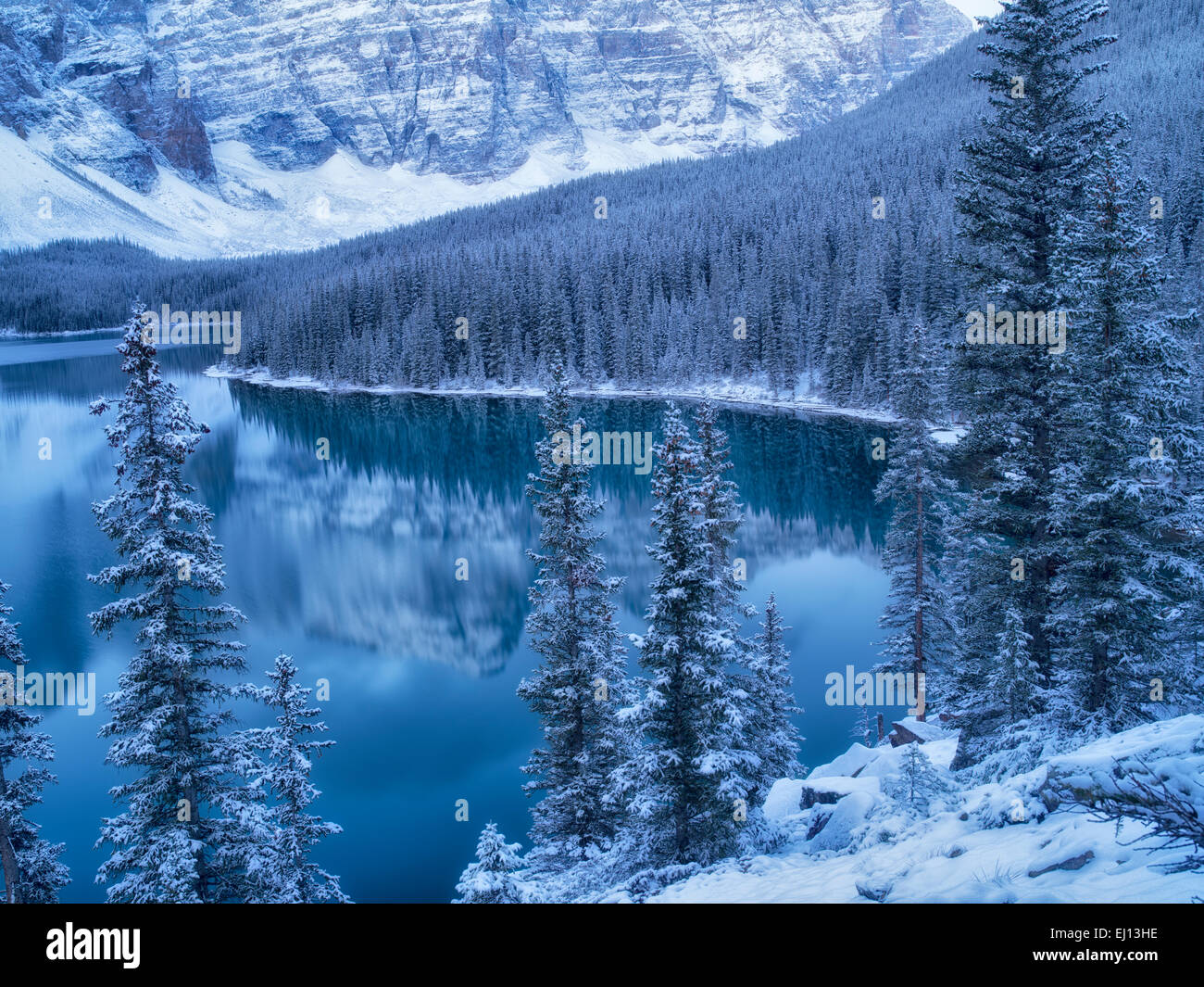 First snow of the season on Moraine Lake. Banff National Park, Alberta, Canada Stock Photo