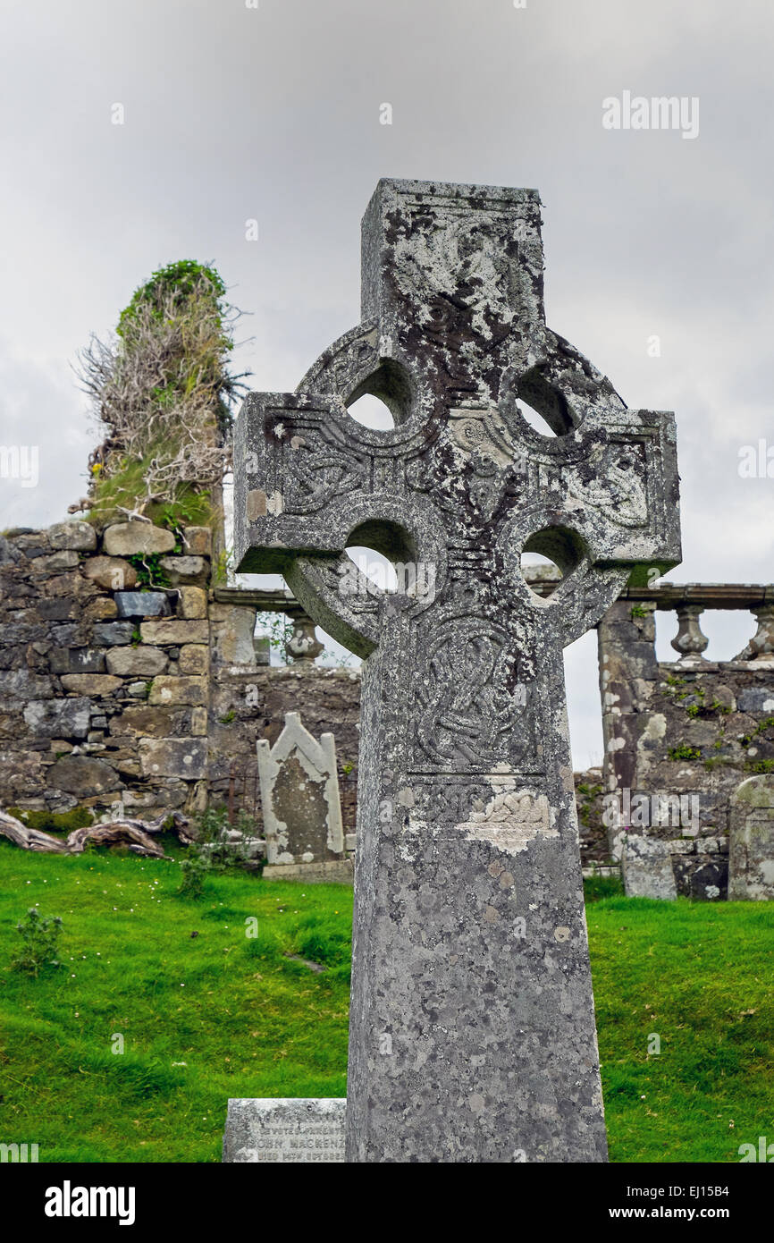 A celtic cross and an old cementary on the Isle of Skye in Scotland Stock Photo