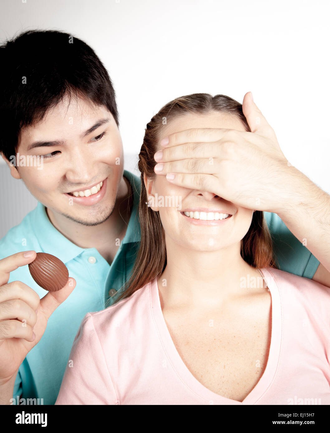 Man giving to a woman a surprice Stock Photo