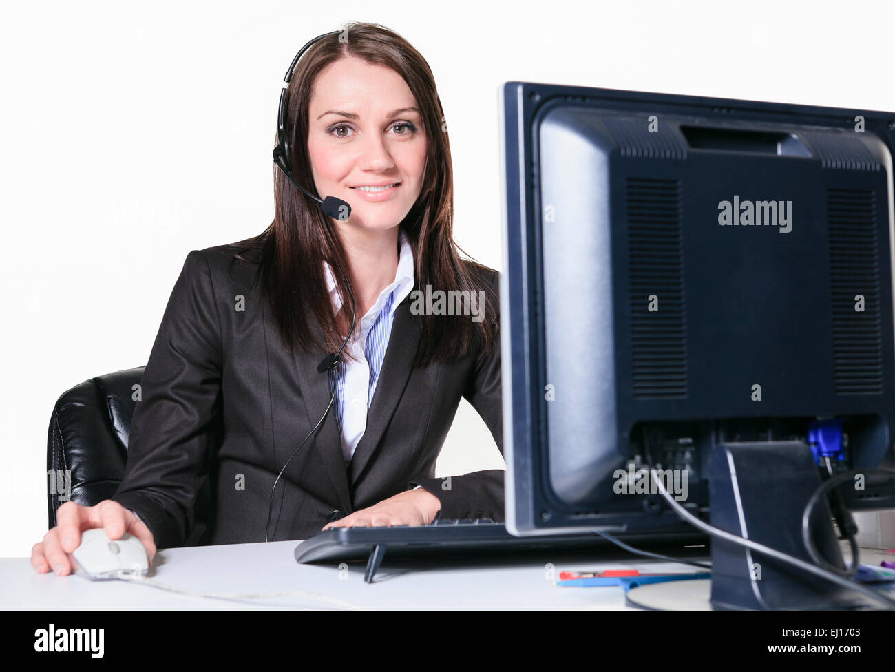 Young pretty business woman with computer in the office Stock Photo - Alamy