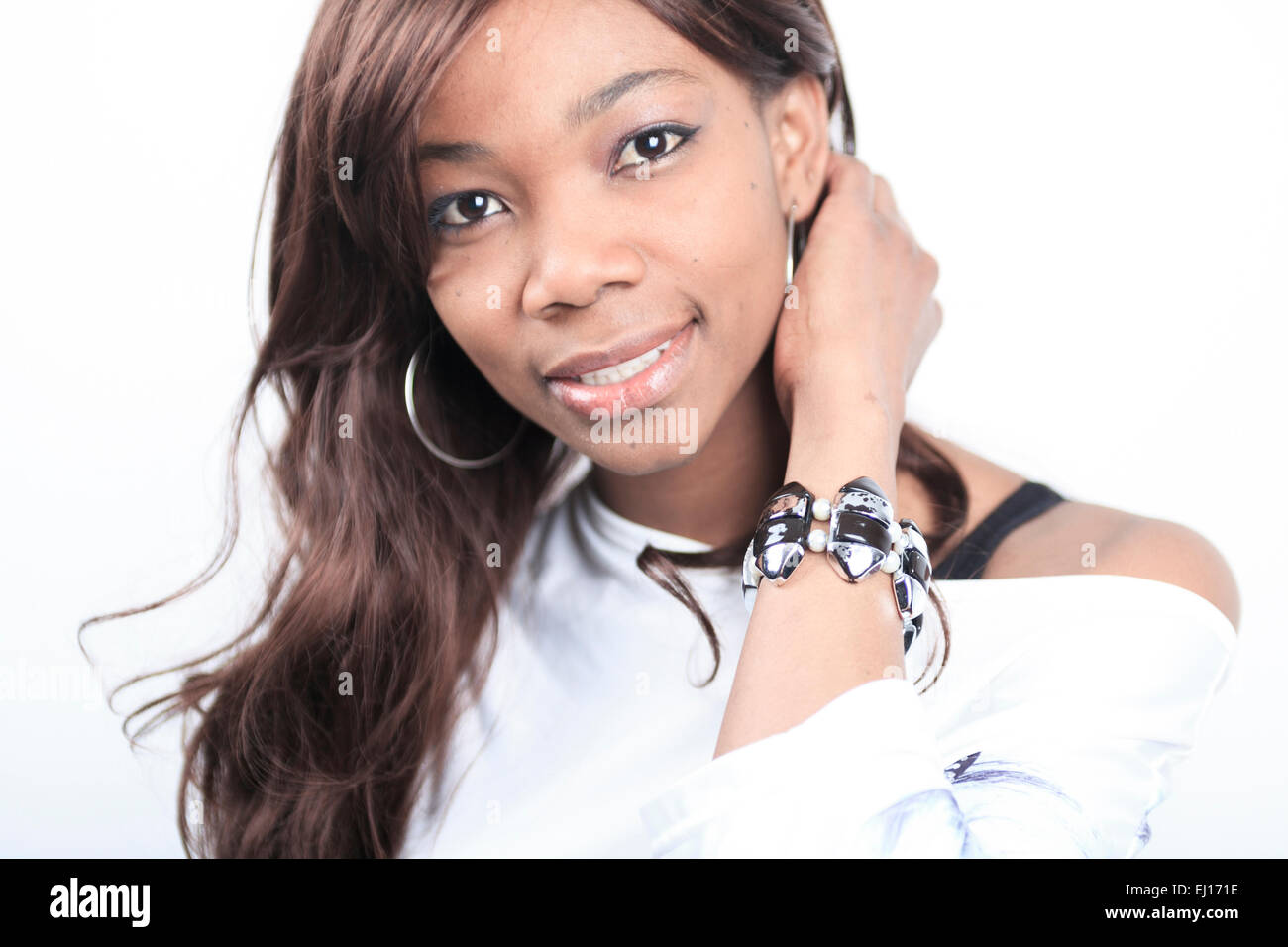 African Woman with Jeans and Crossed Arms Stock Image - Image of beautiful,  colombia: 58520009