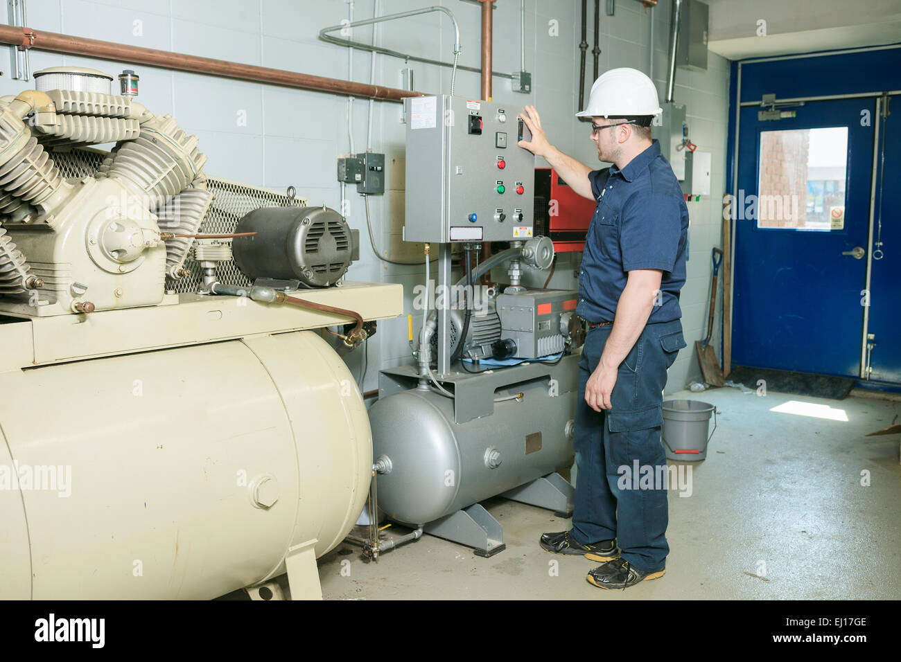 repairman engineer or inspector who check the system Stock Photo Alamy