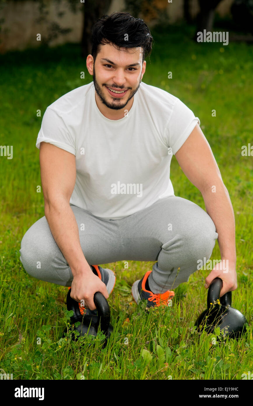 portrait of young athletic male model laughing after sport time Stock Photo