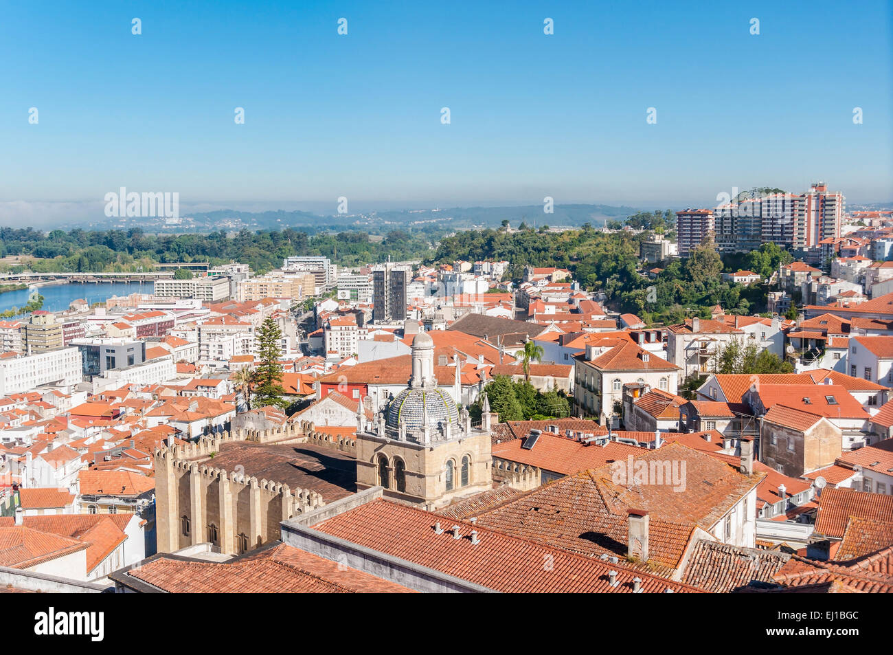 Cityscape over the roofs of Coimbra with The Old Cathedral of Coimbra, Portugal Stock Photo
