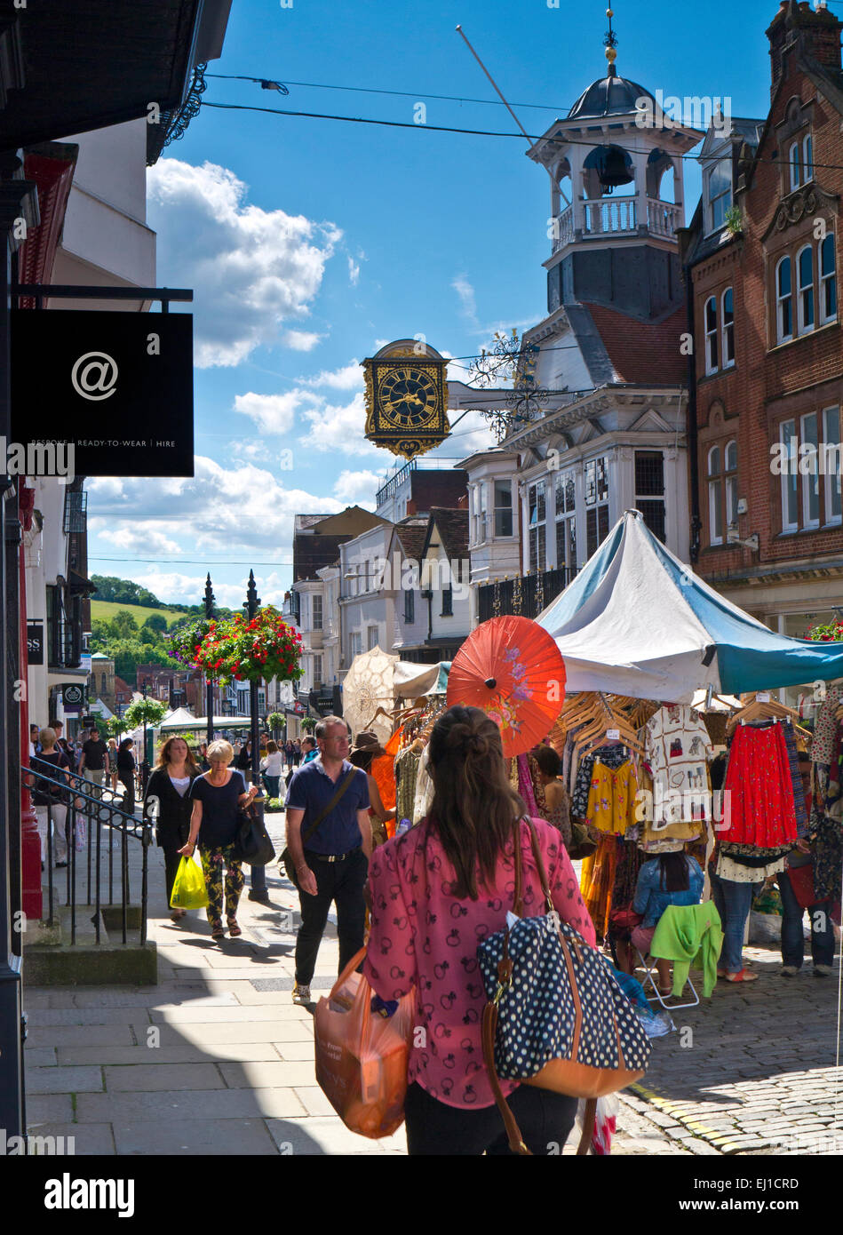 Guildford historic High Street and shoppers on a busy summer market day