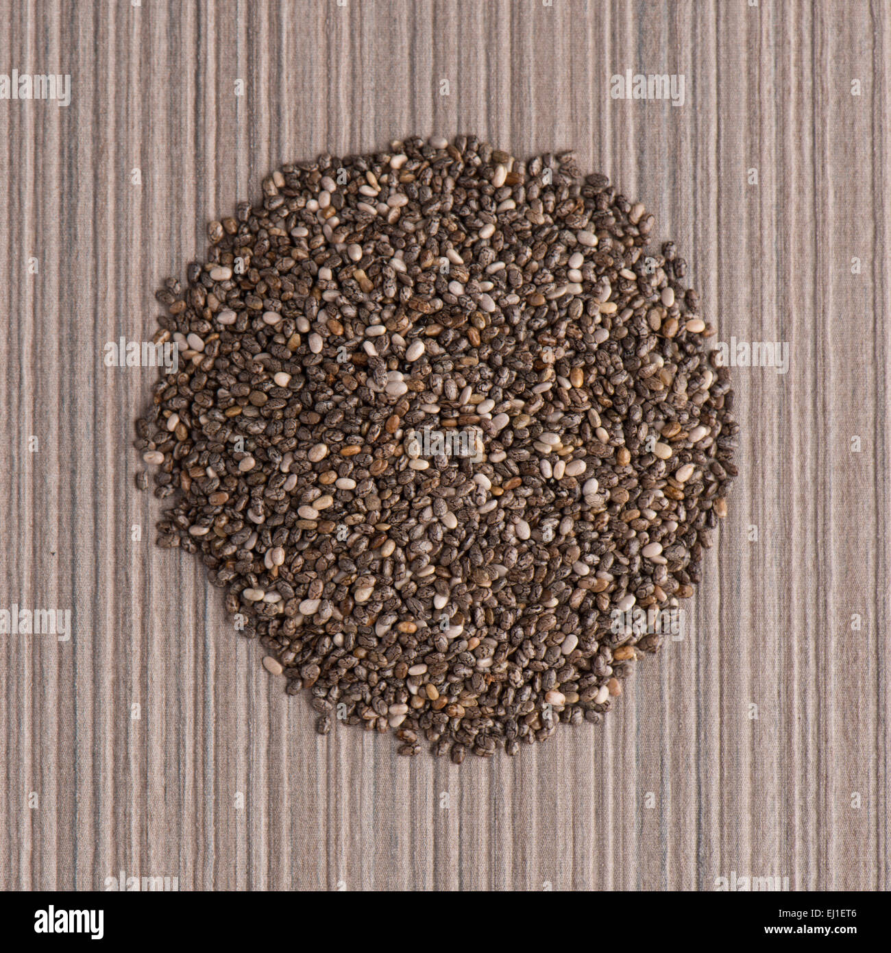 Top view of chia seeds against beige vinyl background Stock Photo - Alamy