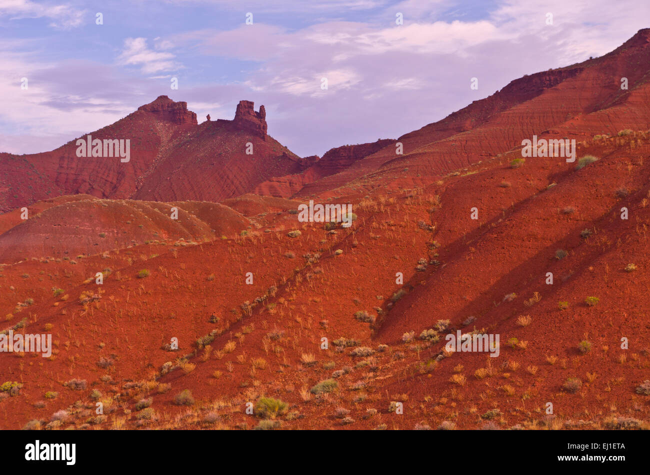 Red desert hills at the entrance to Castle Valley, near Arches National Park, Utah, United States. Stock Photo