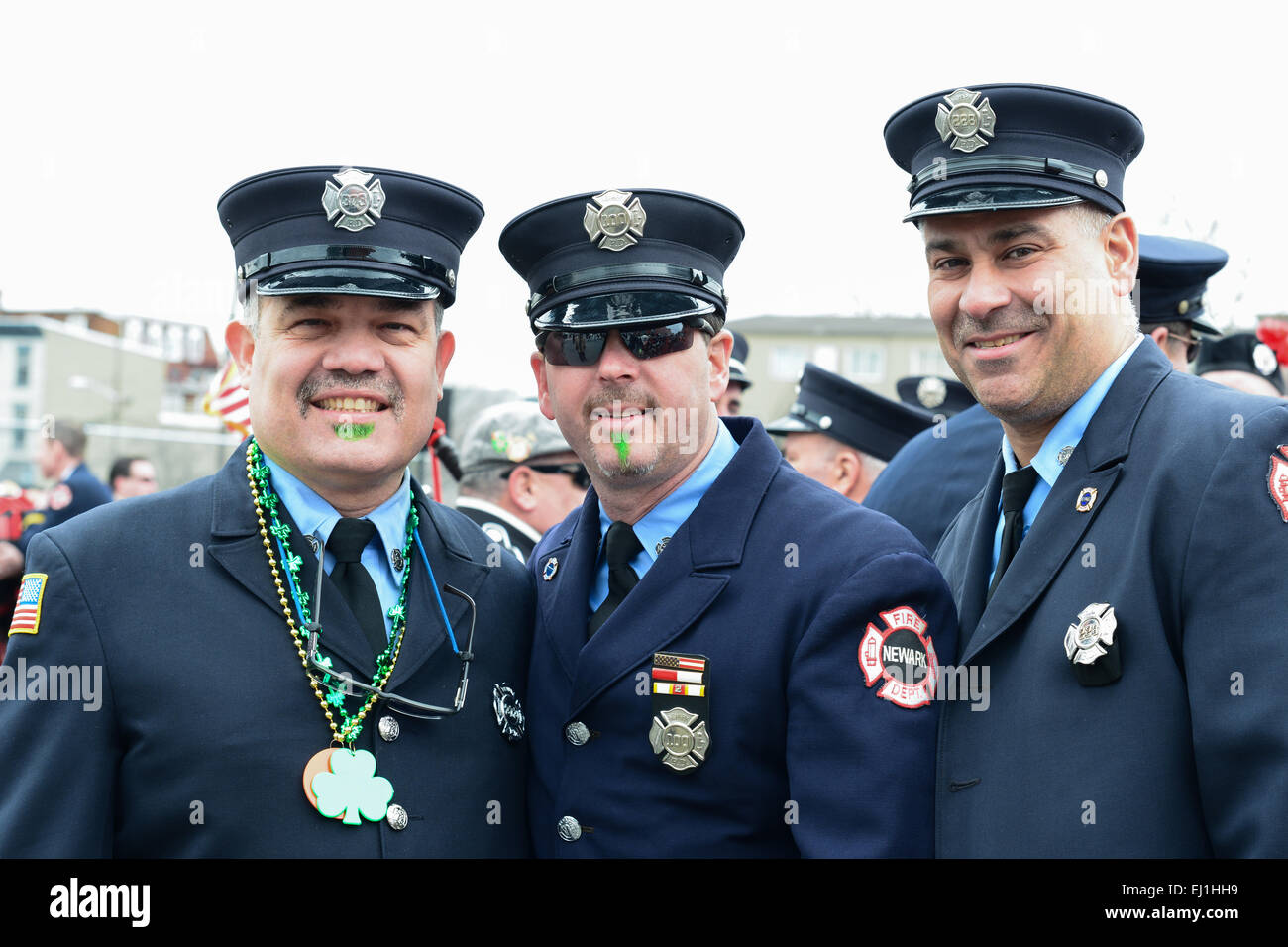 Newark firefighters celebrating the 2013 St. Patricks Day parade. Newark, New Jersey. USA Stock Photo