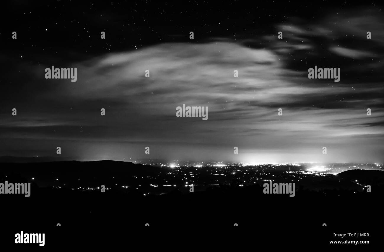 The night sky and towns in the Shenandoah Valley, seen from Skyline Drive in Shenandoah National Park, Virginia. Stock Photo