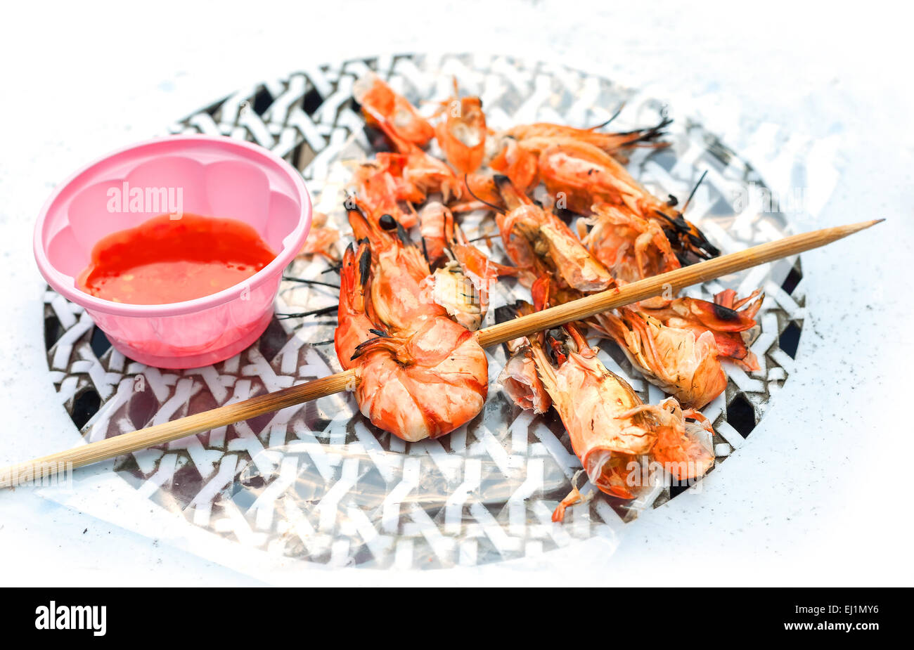 Grilled shrimps with sweet garlic chilli Sauce, street food. Stock Photo