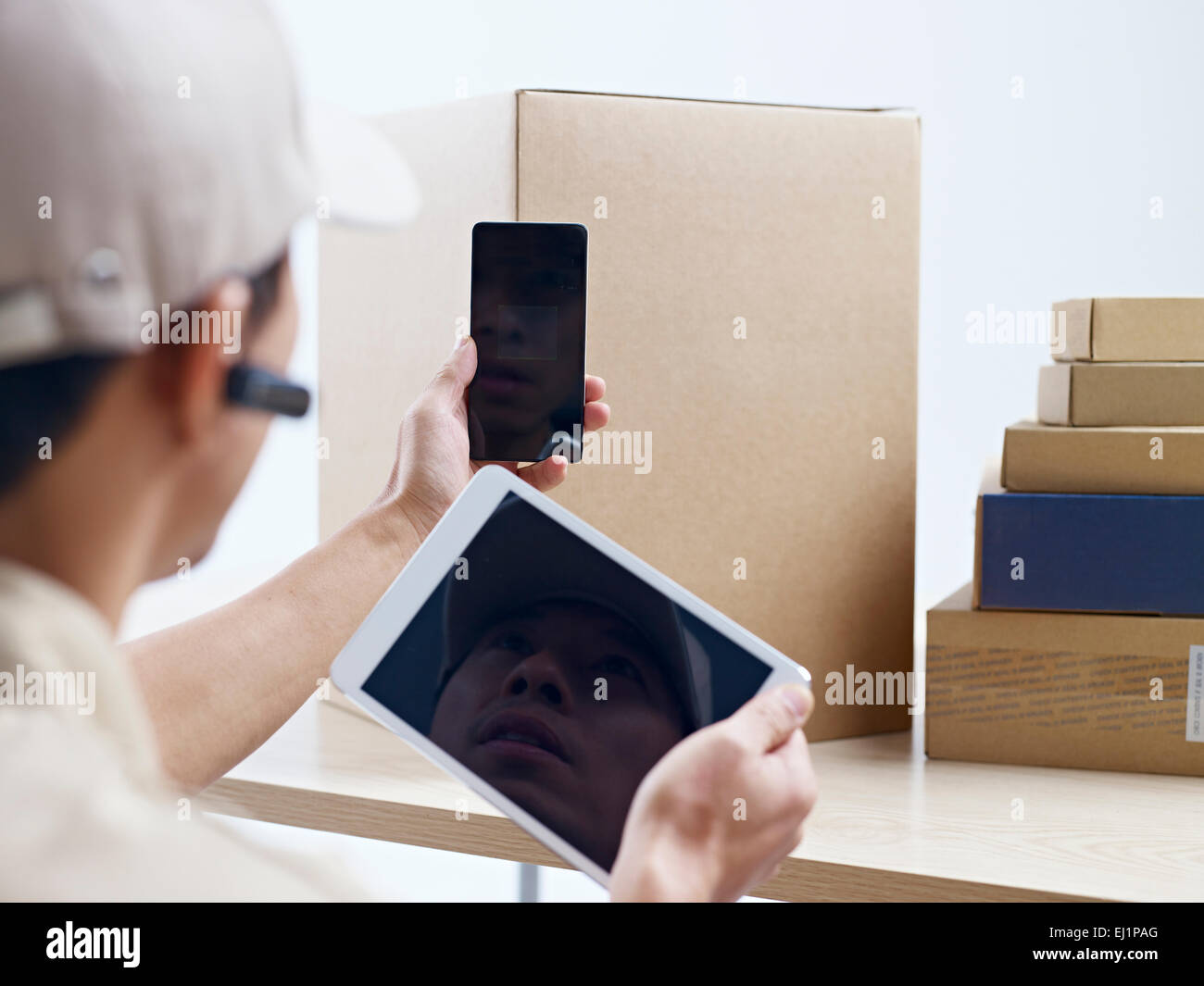 courier company worker at work Stock Photo