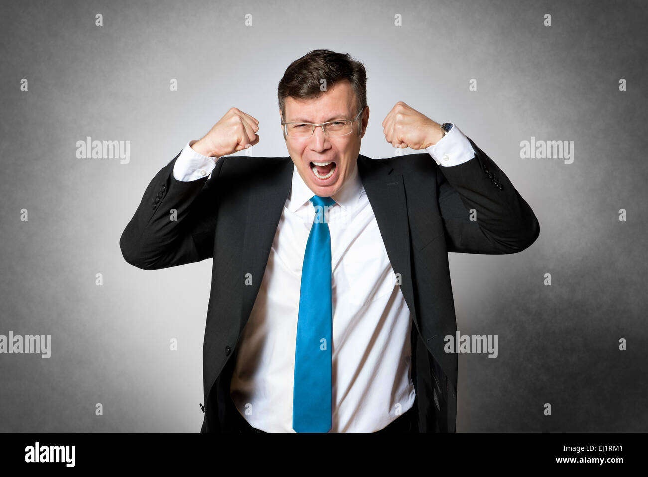 Image of frustrated crying business man in dark suit Stock Photo