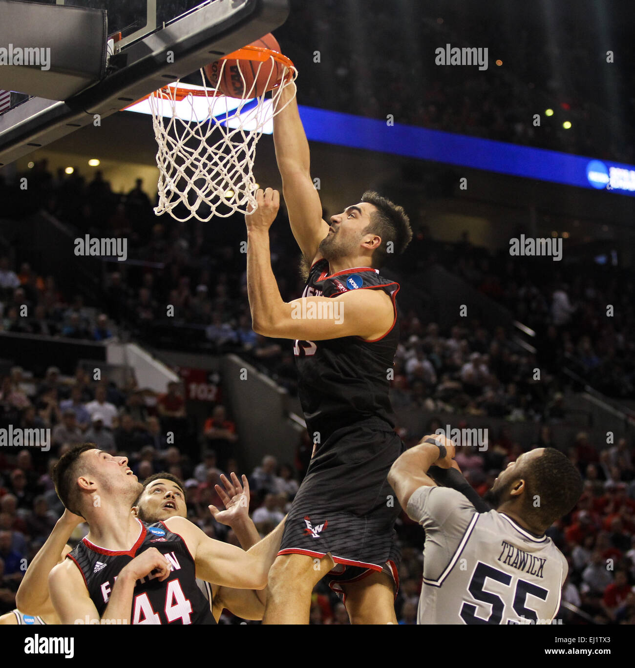Portland, Oregon, USA. 19th March, 2015. VENKY JOIS (55) dunks the ball. The Georgetown Hoyas play the Eastern Washington Eagles at the Moda Center on March 19, 2015. Credit:  David Blair/ZUMA Wire/Alamy Live News Stock Photo
