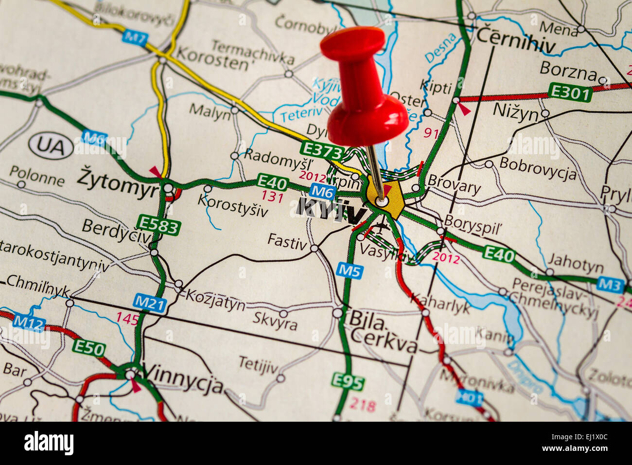 A red pushpointer pointing at Kiev. Stock Photo