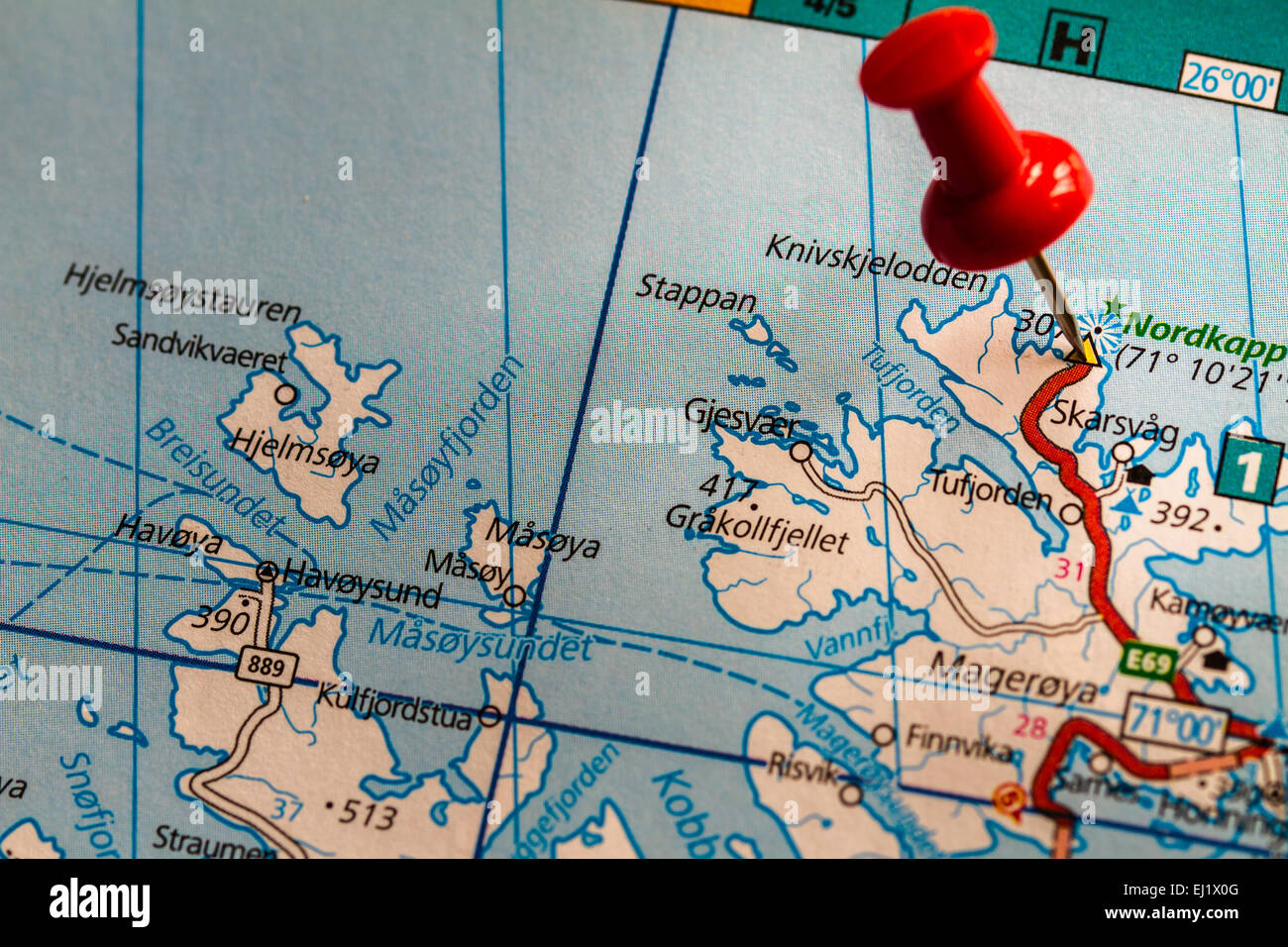 A red pushpointer pointing at Nordkapp. Stock Photo