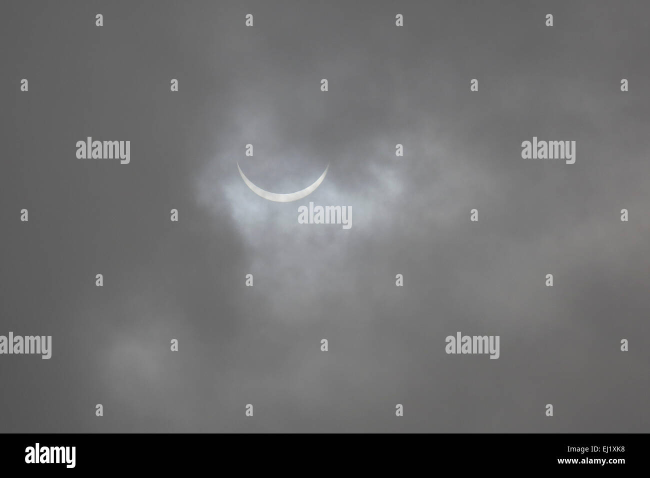The solar eclipse in Sunderland, England. Grey clouds obscure the view