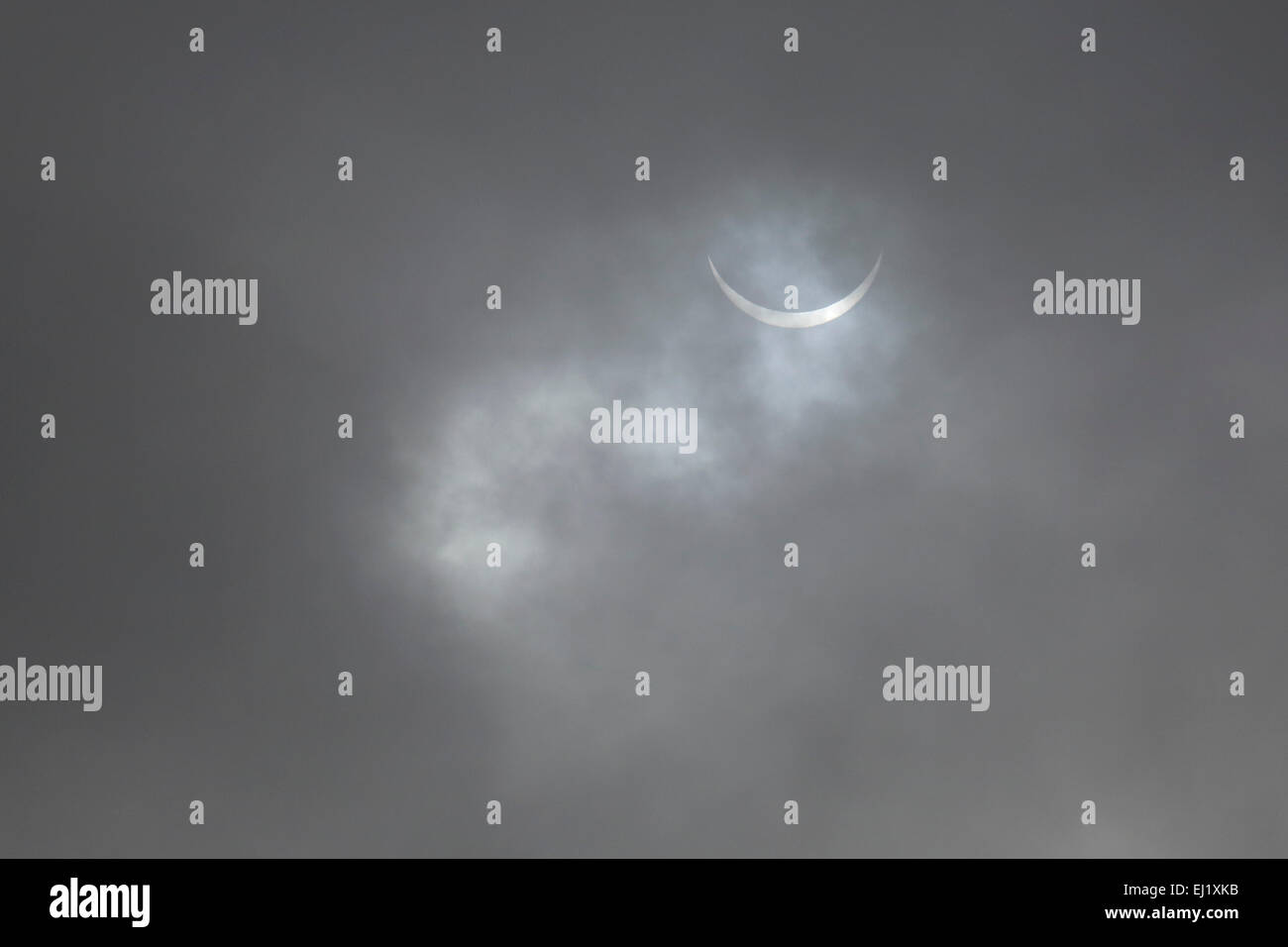 The solar eclipse in Sunderland, England. Grey clouds obscure the view