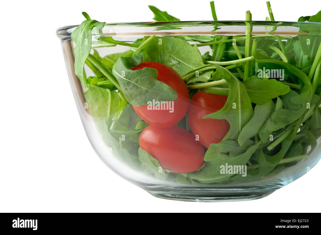 salad with arugula and cherry tomato in glass bowl  with clipping path Stock Photo