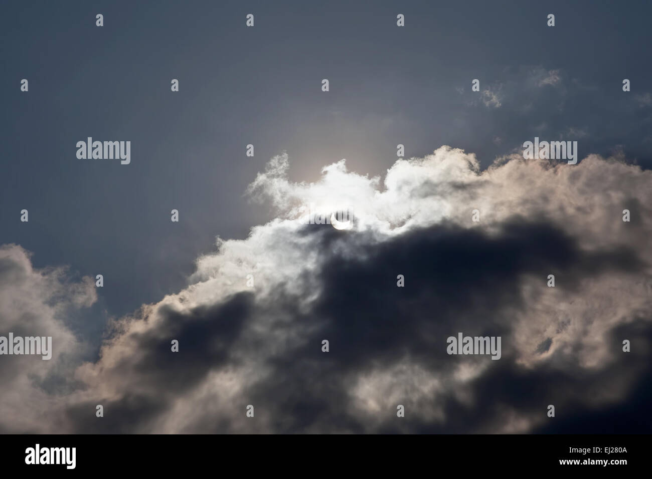 Sun eclipse during the daytime with some clouds (actual image Stock ...