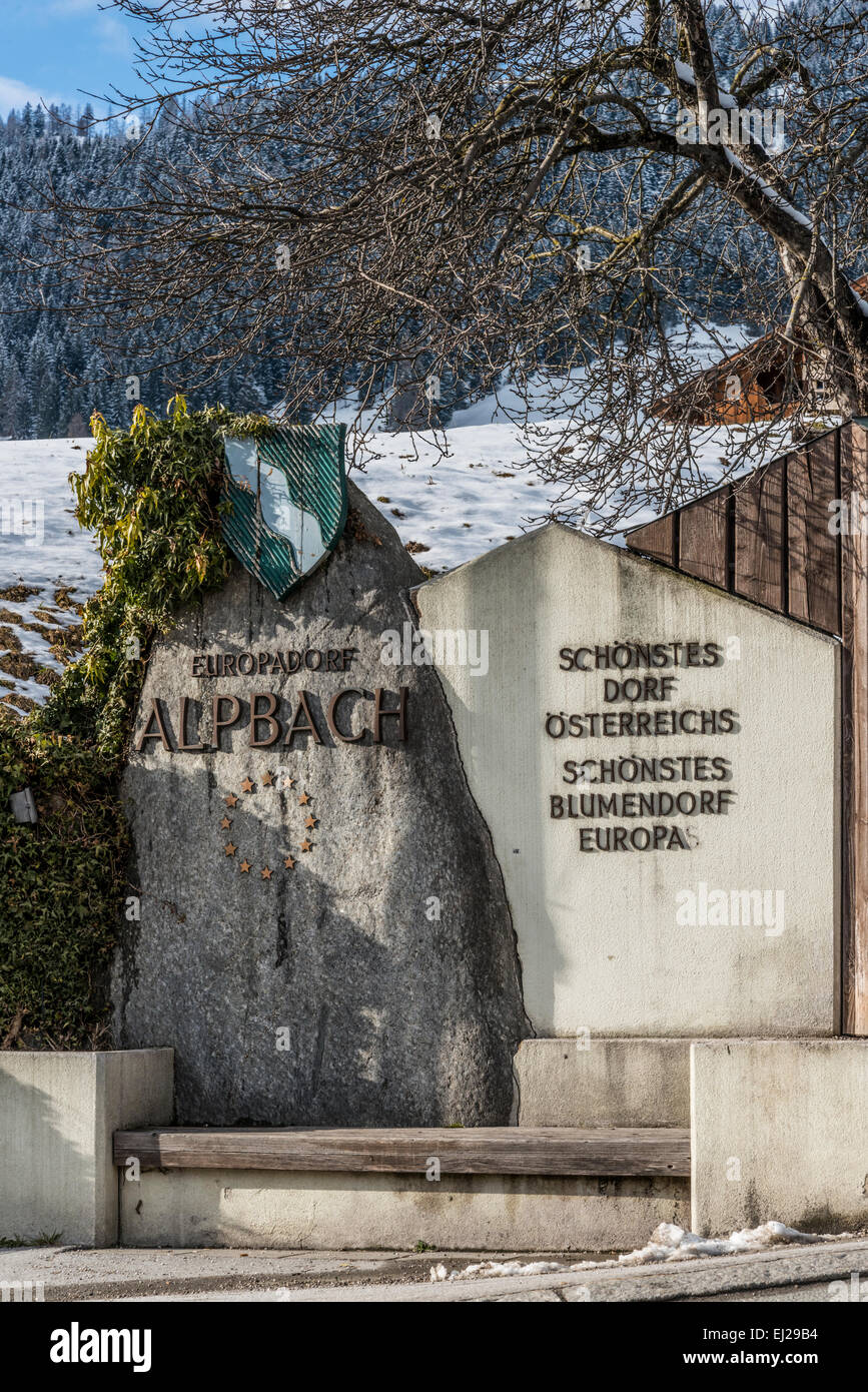 Alpbach village marker post-stone Stock Photo