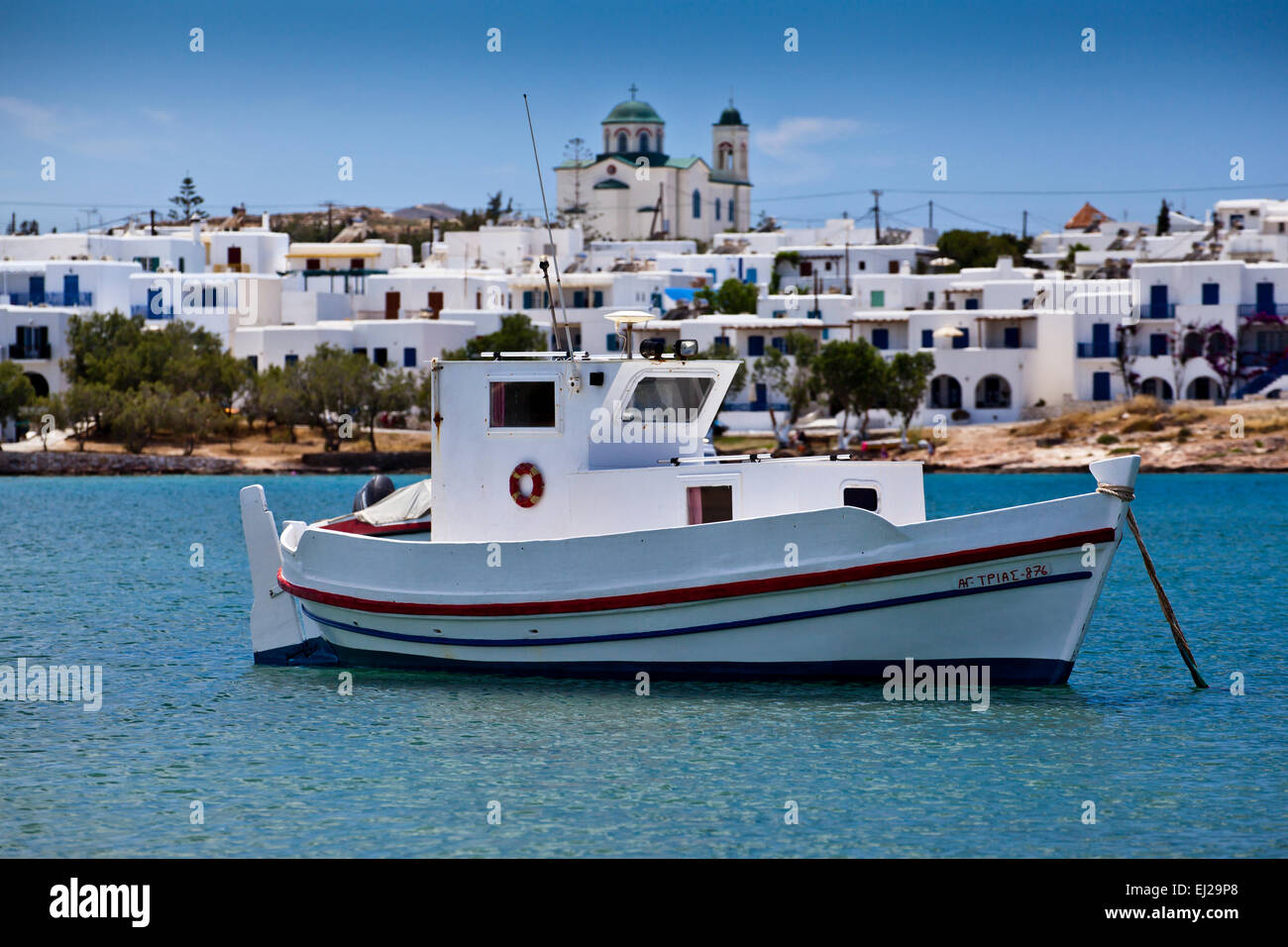 Scene from Agii Anargiri beach in Naoussa in Paros, Greece. Stock Photo