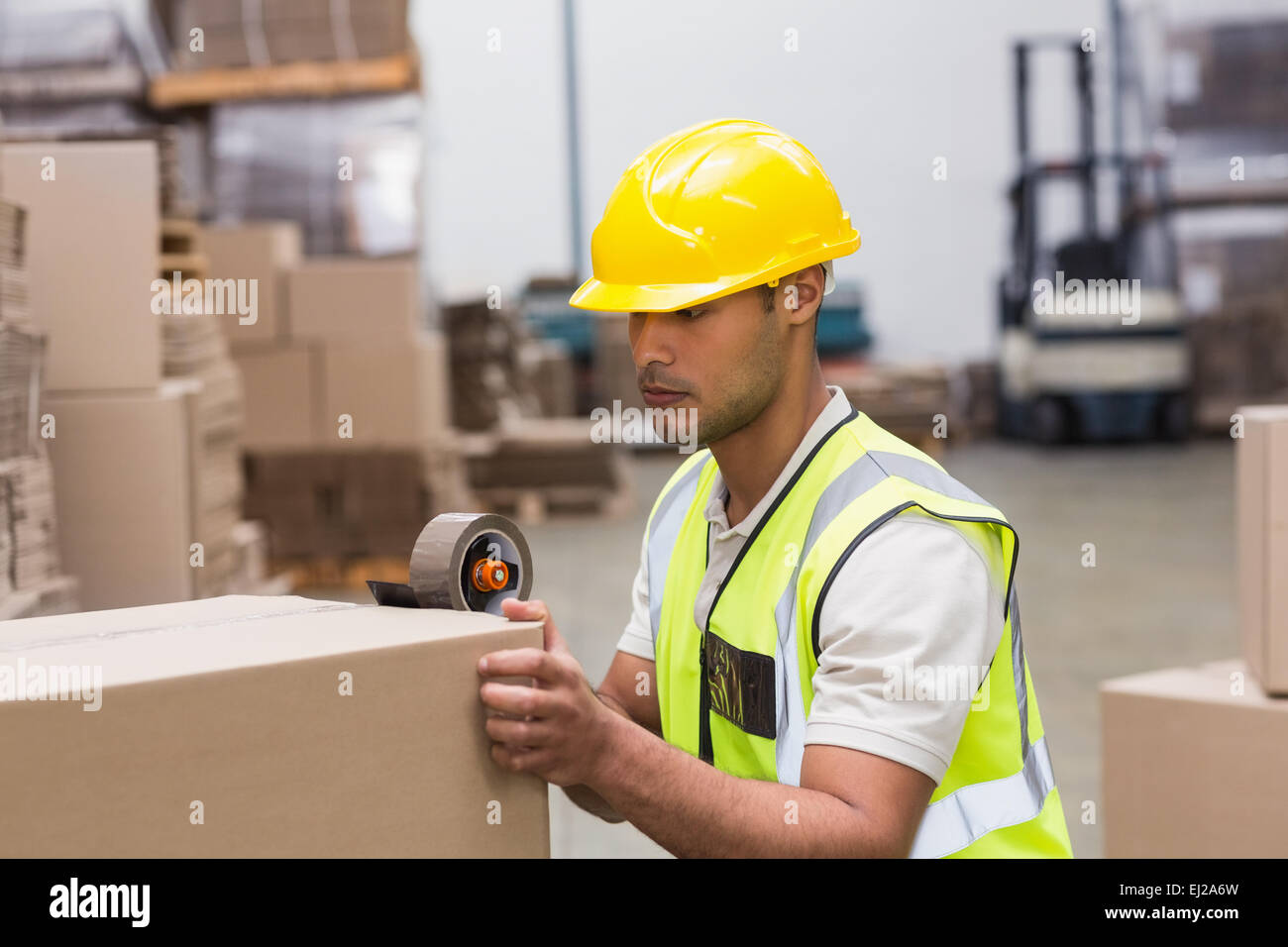 Worker preparing goods for dispatch Stock Photo