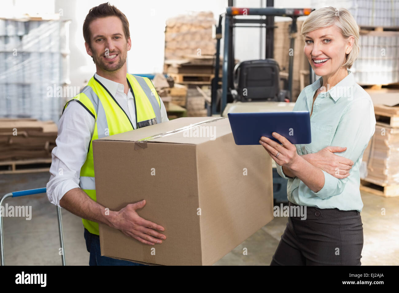 Warehouse manager and foreman working together Stock Photo Alamy