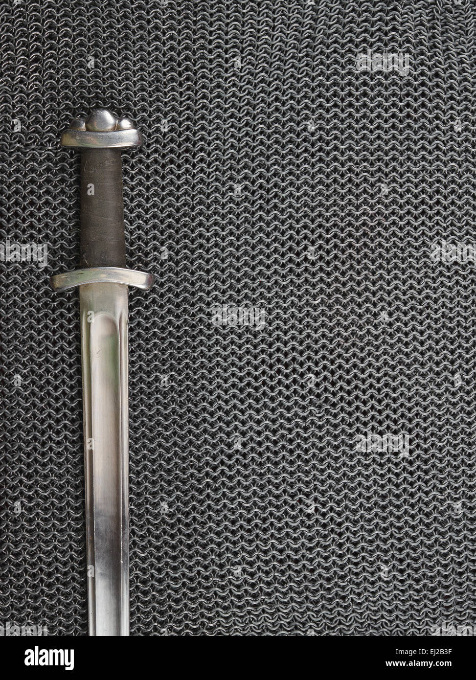 Medieval chainmail armour and sword, text space Stock Photo Alamy