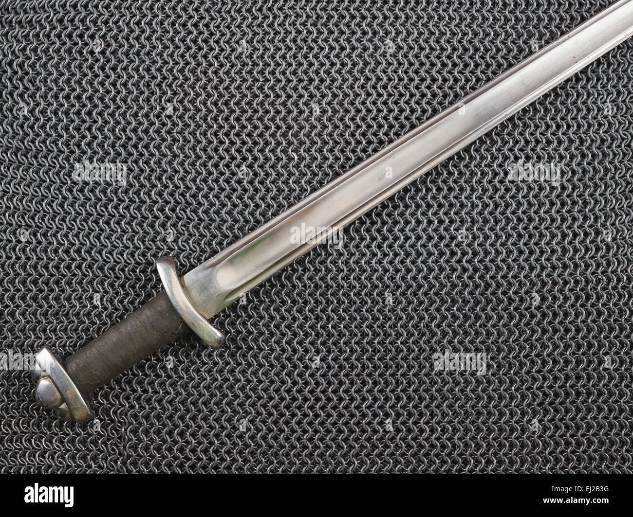 Medieval chainmail armour and sword, text space Stock Photo Alamy